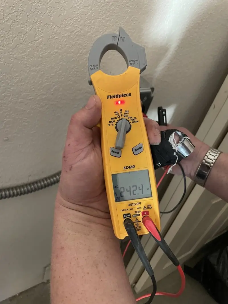 Voltage testing with clamp meter during Electrical Installation Services in Dade City